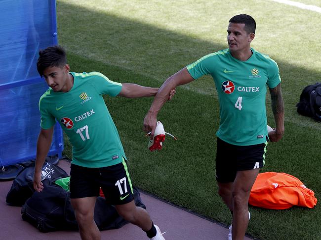 Relaxed....Tim Cahill and Daniel Arzani muck around at training. Pic: Toby Zerna
