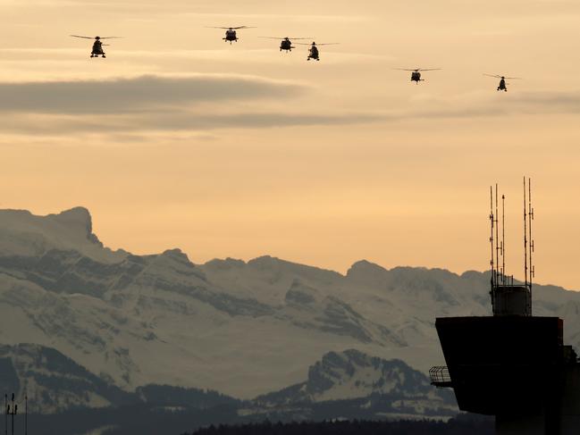 Helicopters approach to land before the arrival of U.S. President Donald Trump at Zurich airport, Switzerland January 25, 2018. REUTERS/Arnd Wiegmann     TPX IMAGES OF THE DAY - RC19ACC411B0