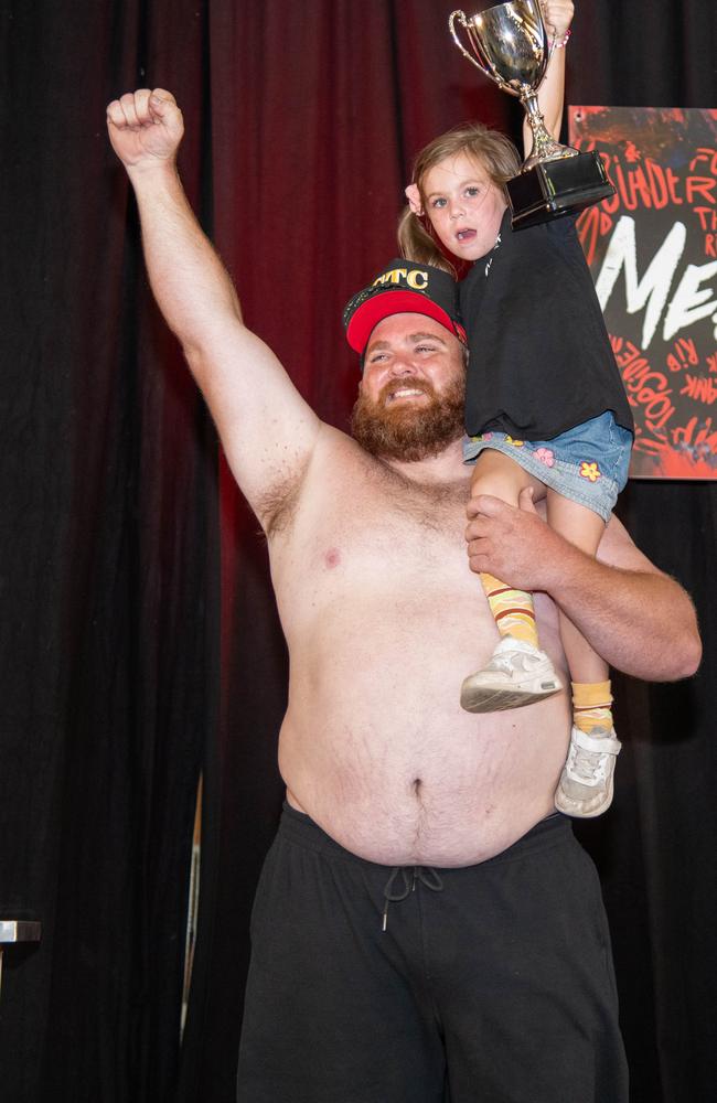 Winner of the Best Dad Body competition, Luke Billin with his daughter Madalin.Meatstock - Music, Barbecue and Camping Festival at Toowoomba Showgrounds.Saturday March 9th, 2024 Picture: Bev Lacey