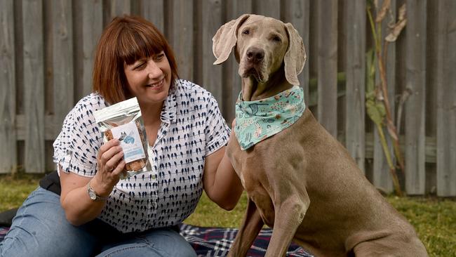 Sue Evans-Lane with her Weimaraner Aaron and the healthy dogs treats named after him. Picture: Evan Morgan