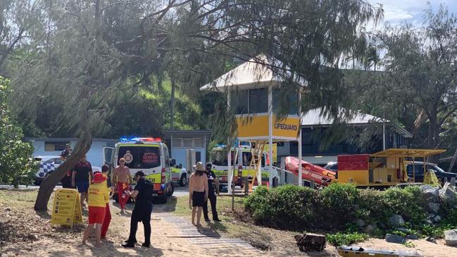 Paramedics and police tending to the teenager. Picture: Tara Miko