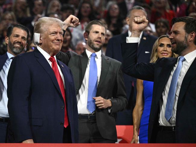 Trump smiles as he is cheered on by Vance and his sons Donald Trump Jr. and Eric Trump during the first day of the 2024 Republican National Convention. Photo: AFP.