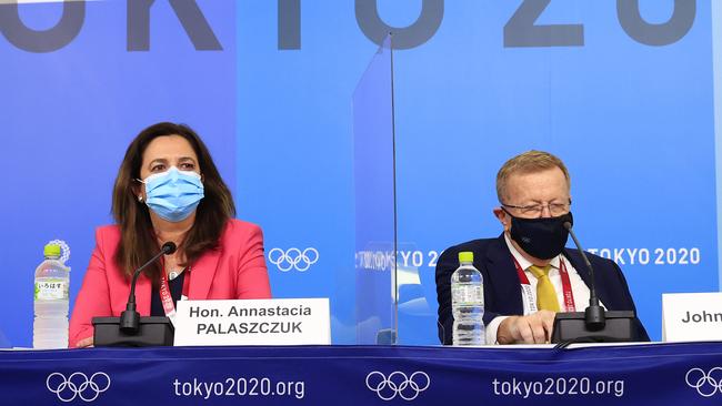 Queensland Premier Annastacia Palaszczuk with John Coates speak at a press conference at the MPC at the Tokyo 2020 Olympics after she successfully bid to hold the 2032 Olympics in Brisbane. Pics Adam Head