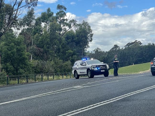 Police closed off the Princes Fwy entrance on Haunted Hills Rd in Hernes Oak on Tuesday morning. Picture: Jack Colantuono