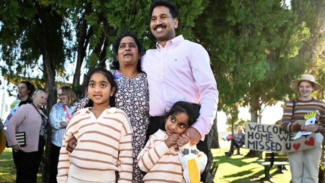 Priya and Nades Murugappan and their daughters Kopika and Tharnicaa pose for a photo after arriving at the Thangool Aerodrome near Biloela in June 2022. Picture: Getty Images