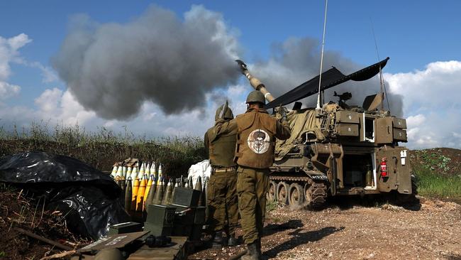 An Israeli artillery unit along the Israel-Lebanon border fires toward a target in Lebanon. Picture: Shutterstock/WSJ