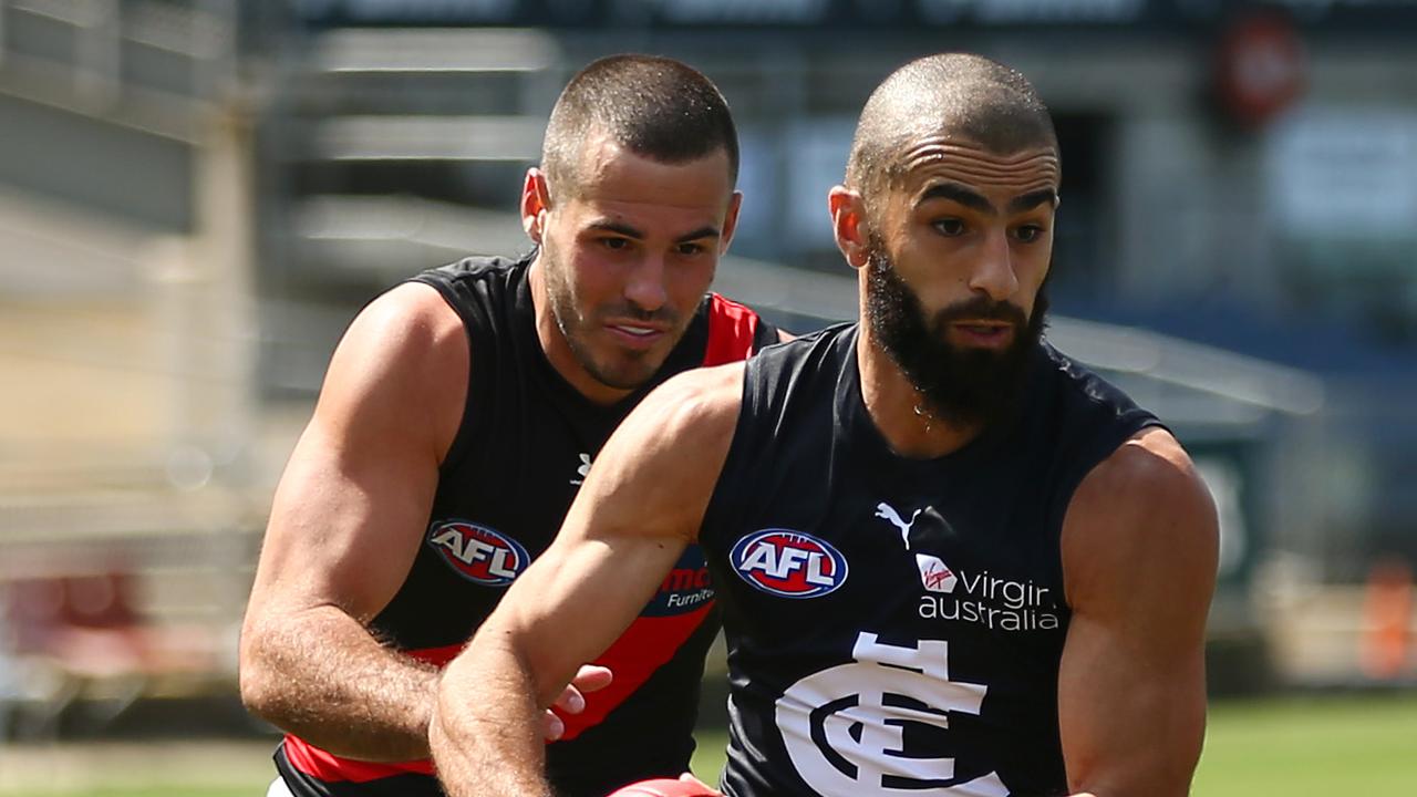 Adam Saad charges away from a tackler during Carlton’s pre-season win over Essendon.