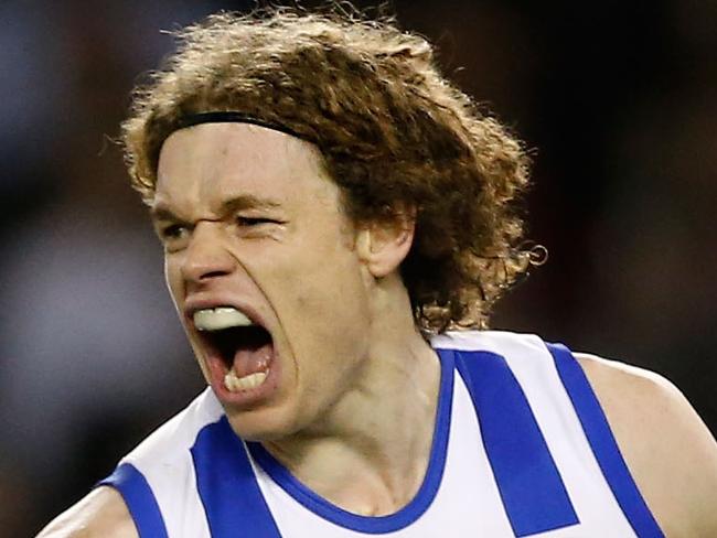 MELBOURNE, AUSTRALIA - JULY 17: Ben Brown of the Kangaroos celebrates a goal during the 2015 AFL round 16 match between the North Melbourne Kangaroos and the Essendon Bombers at Etihad Stadium, Melbourne, Australia on July 17, 2015. (Photo by Adam Trafford/AFL Media/Getty Images)