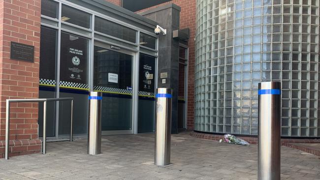 Flowers left at Port Adelaide police station after the death of the police officer on Monday. Picture: Tara Miko