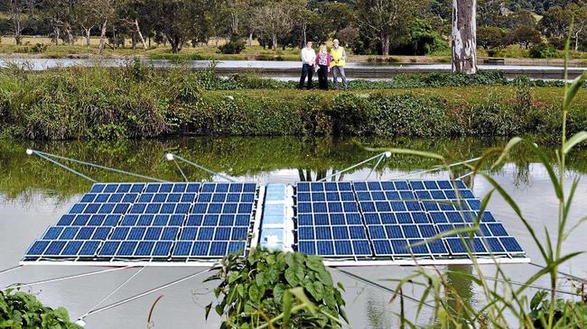 INNOVATION: Lismore City Council's water and wastewater manager Matt Torr, environmental strategies officer Sharyn Hunnisett and council consultant Michael Qualmann at East Lismore Sewage Treatment Plant where a community funded floating solar project will be placed. (Image shows what floating solar project will look like). Picture: Cathy Adams