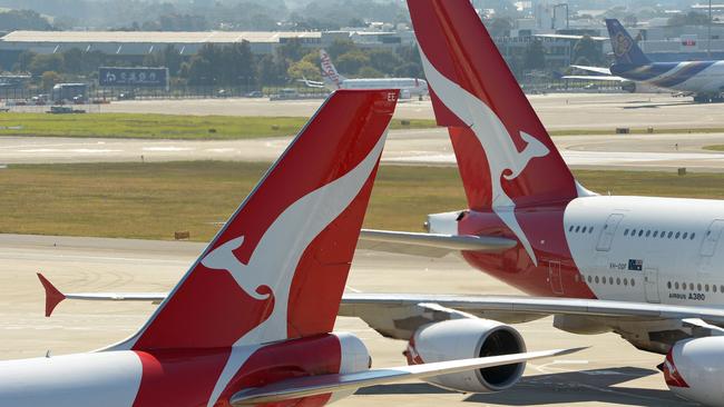 Qantas said it had no warning passengers had come off cruise ships and would have taken precautions if it had known. Picture: Greg Wood/AFP