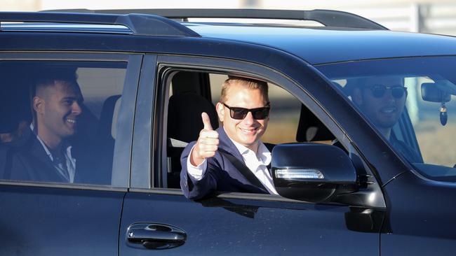 Transport Minister Stephan Knoll gives the thumbs up as he is the first car to head north from the Southern interchange of the Northern Connector Image/ Russell Millard / AAP.