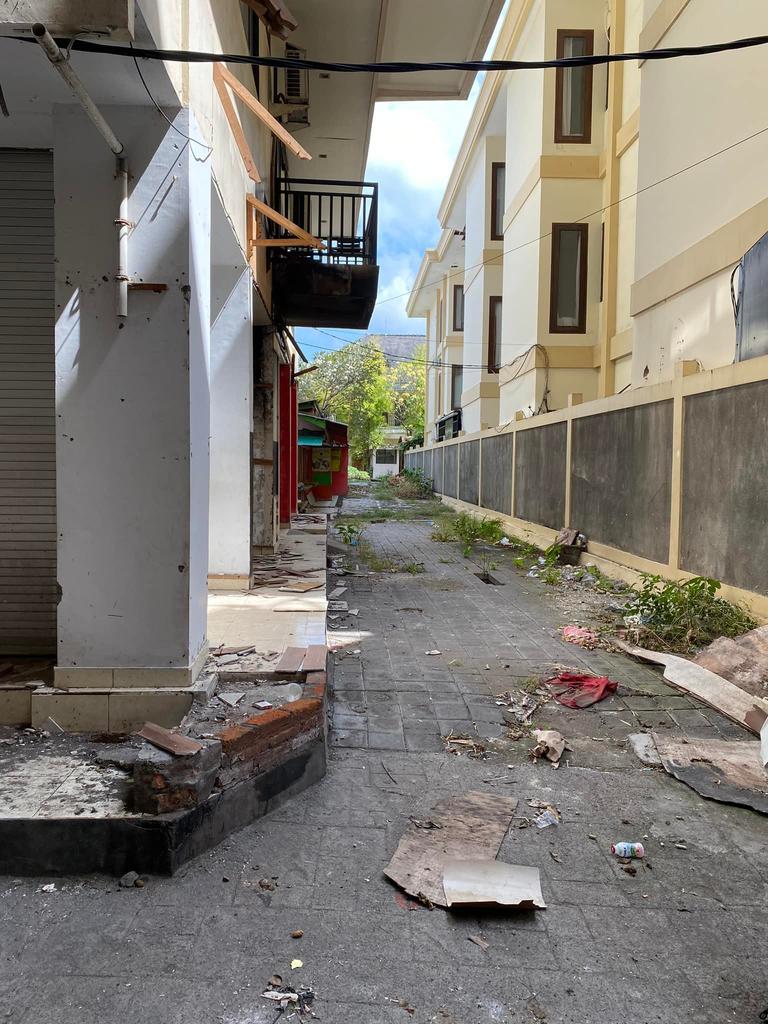 Rubbish is strewn in the street. Picture: Kat Willeme