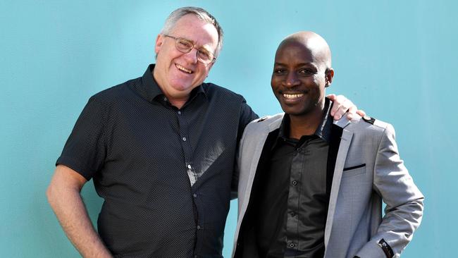 Mental health professional Stephen Odorcic with Northern suburbs resident Modeste HATUNGIMANA, who won a pride of australia award in the "fair go" category. He has established a mental health program for disadvantaged people in Africa, he will be travelling to Burundi with Stephen. Pic: Tricia Watkinson