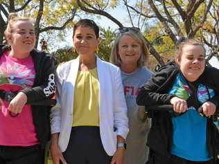 Sisters Gemma and Shaye Harrison with mother Sandra Harrison and their former support worker Mayor Tanya Milligan. Picture: Ebony Graveur