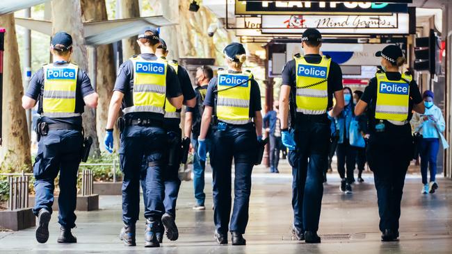 Police patrol the streets of Melbourne at the start of a “circuit breaker” lockdown.