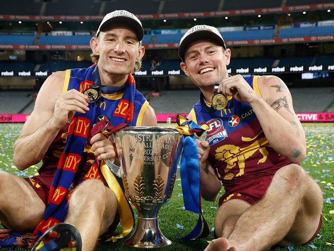 MELBOURNE, AUSTRALIA - SEPTEMBER 28: Harris Andrews (left) and Lachie Neale of the Lions celebrate during the 2024 AFL Grand Final match between the Sydney Swans and the Brisbane Lions at The Melbourne Cricket Ground on September 28, 2024 in Melbourne, Australia. (Photo by Michael Willson/AFL Photos via Getty Images)