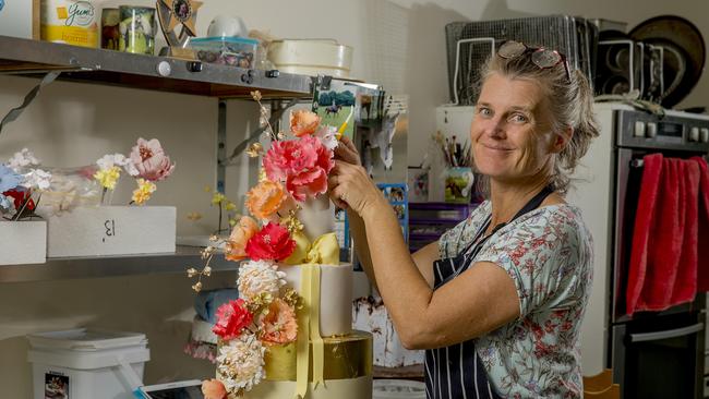 Local cake maker, Louisa Massignani from Cakes Alouisa with one of her creations. Picture: Jerad Williams