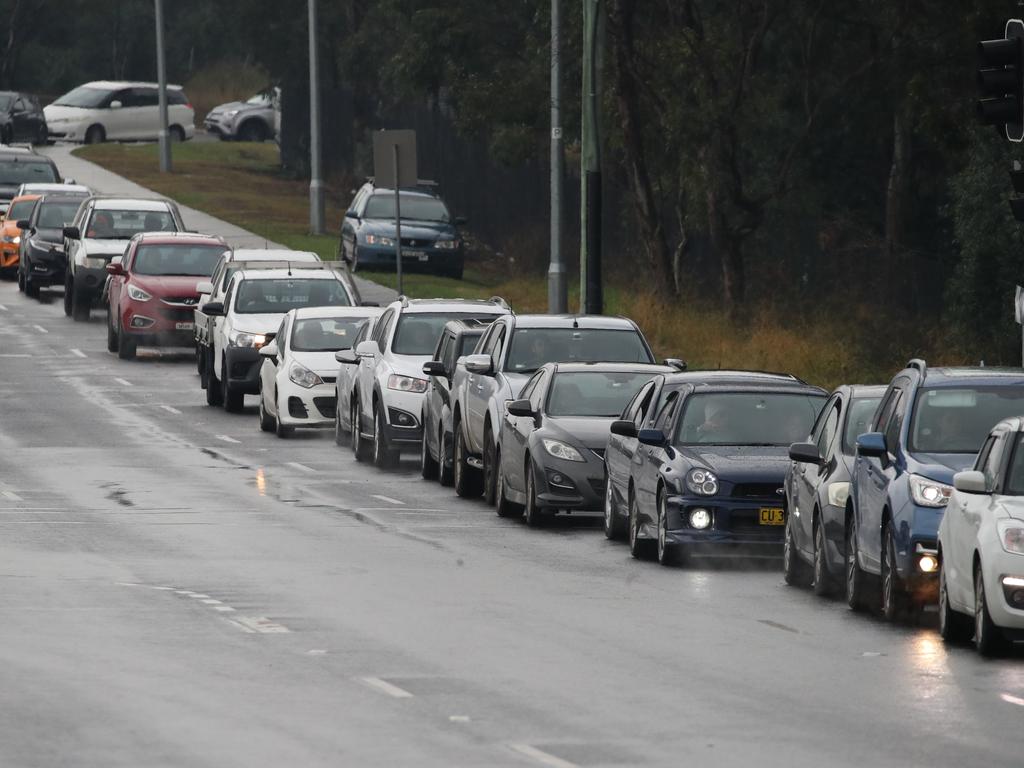 There were long queues of cares this morning to get into the clinic. Picture: David Swift