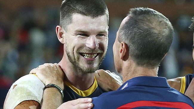 Crows coach Don Pyke congratulates Bryce Gibbs after the Richmond win. Picture Sarah Reed