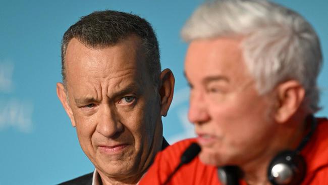 Director Baz Luhrmann and actor Tom Hanks (right) front up to the press at Cannes. Picture: AFP