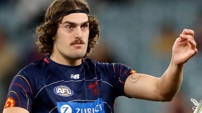 Luke Jackson of the Demons warms up during the 2022 AFL Second Semi Final match between the Melbourne Demons and the Brisbane Lions at the Melbourne Cricket Ground.