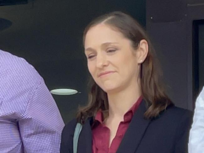 Jessica Blinda Polsoni (center) Hanbury leaves Mackay courthouse after the murder charge against her was committed to the supreme court.