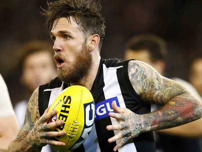 Dane Swan runs forward during the 2nd quarter of the Carlton v Collingwood match at the MCG. Friday July 5, 2013.