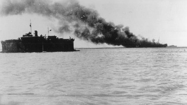  A ship on fire in the Darwin Harbour on, February 19, 1942, after Japanese forces bombed the northern coast of the Top End 