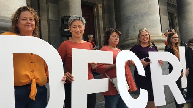 State Labor MP Nat Cook with Federal Labor Senator Penny Wong and State Labor MP Katrine Hildyard (fourth from left) at the pro-abortion rally in Adelaide this month.