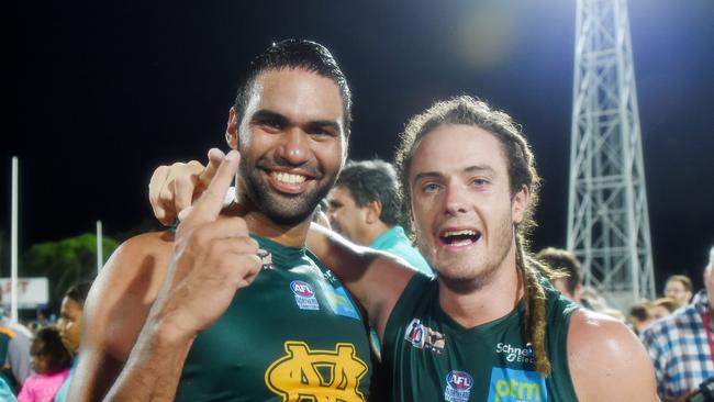 Raphael Clarke and Jack Geary celebrate a grand final win. Will the 2019-20 NTFL season produce a 33rd Premier League flag?