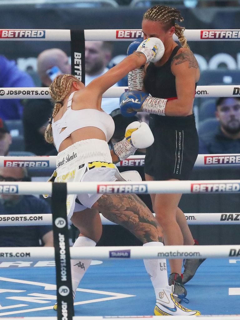 Ebanie Bridges punches Mailys Gangloff. Photo by George Wood/Getty Images.