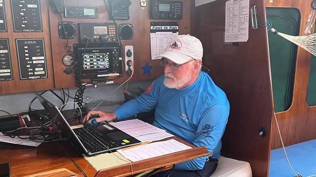 Lindsay May at the navigation station aboard the Antipodes yacht