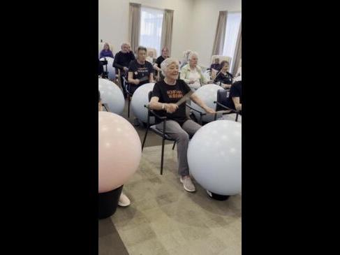 Aged care residents keep fit with drumming