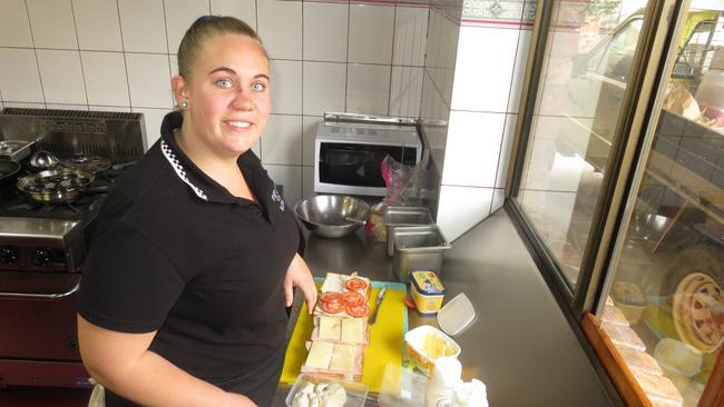 Danika Withers prepares delicious toasted sandwiches in the Popular Cafe Ravenshoe kitchen. David Anthony photo