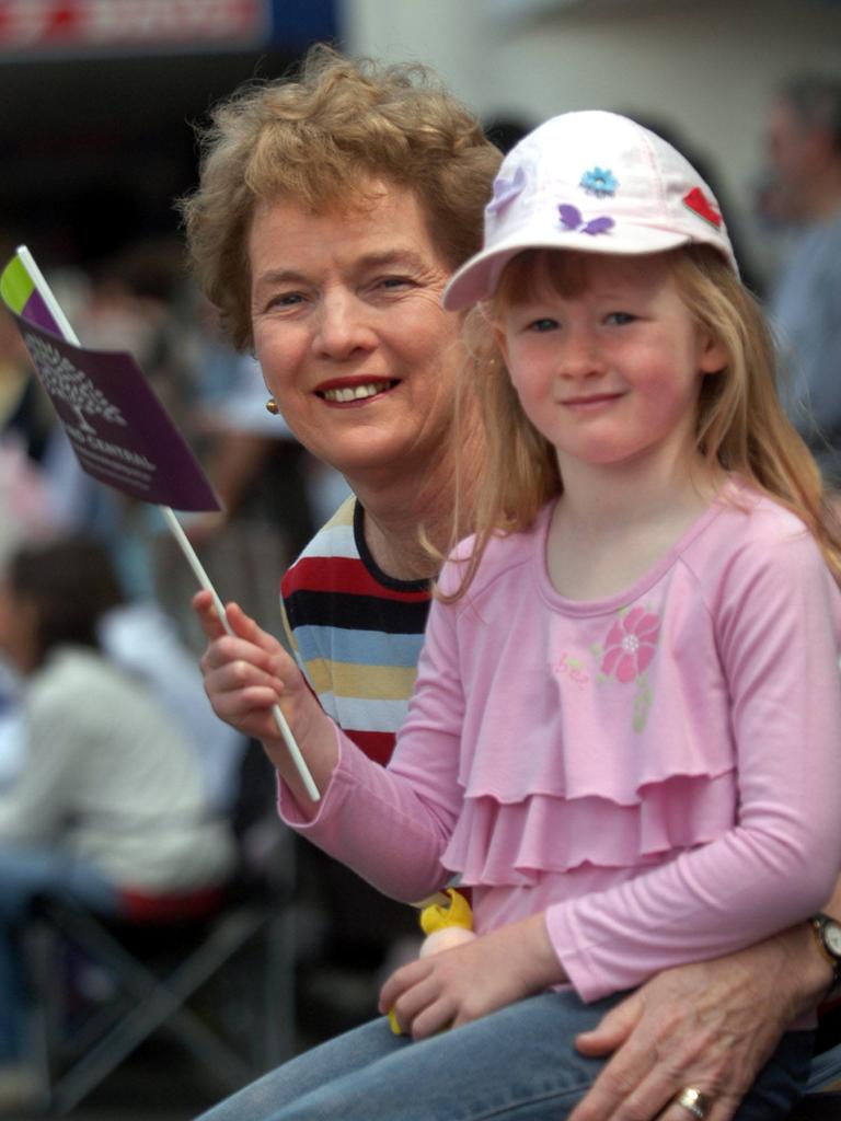 NewsBSM16-09-2006 Excited locals Carol Jarret with her granddaughter Courtney Hockaday. The much anticipated Toowoomba Carnival of Flowers – Street Parade took place through the city. Picture: David Martinelli.