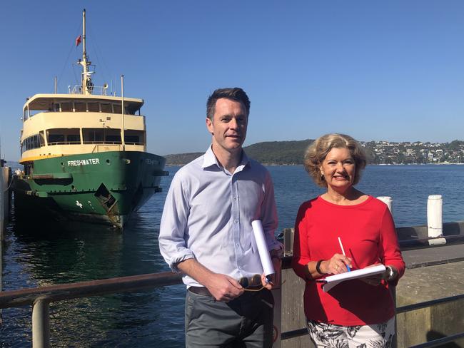 Shadow Transport Minister Chris Minns and Cr Candy Bingham, in front of one of Manly's iconic Freshwater class ferries, which will soon disappear under a shake-up of ferry services. Picture: Julie Cross