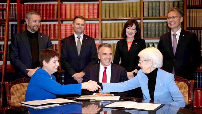 From centre-clockwise: Premier Peter Malinauskas; UofA Chancellor Pauline Carr, UniSA Vice-Chancellor Professor David Lloyd; Treasurer Stephen Mullighan; Deputy Premier Susan Close; UofA Vice-Chancellor Professor Peter Hoj; and UofA Chancellor Catherine Branson. Picture: Emma Brasier