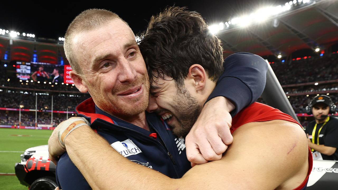 Simon Goodwin hugs Christian Petracca after siren. Photo by Michael Klein