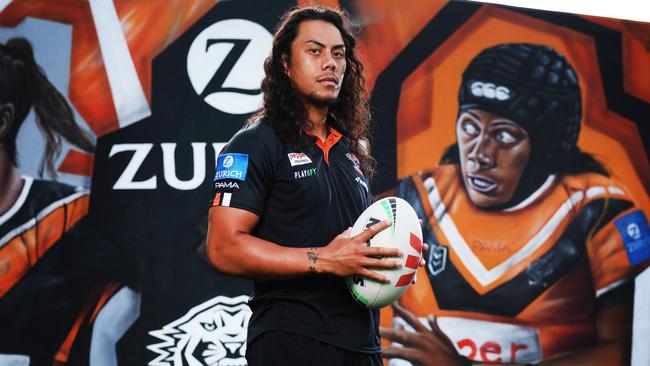 ON HOLD: EMBARGOED UNTIL TUESDAY 6PM: For the The Daily Telegraph 14.12.2024 Jarome Luai pictured in front of the new sponsors mural. Zurich. Wests Tigers members only training session at Zurich Centre, Concord.   Picture: Rohan Kelly