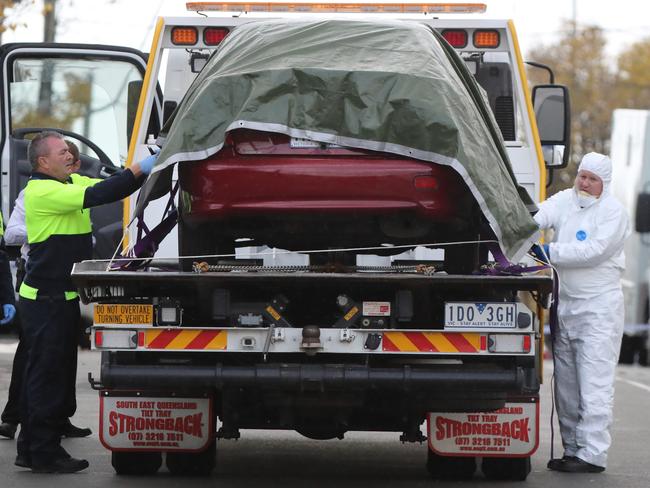 Police remove a car believed to belong to Yacqub Khayre. Picture: Alex Coppel.