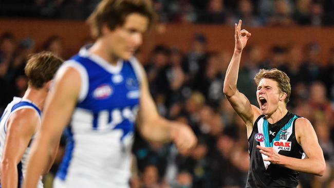 Xavier Duursma of the Power celebrates after kicking a goal against North Melbourne.