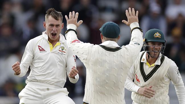 Marnus Labuschagne repaid Tim Paine’s faith in his bowling by claiming the wicket of Jack Leach on the final day at Old Trafford. Picture: Getty Images