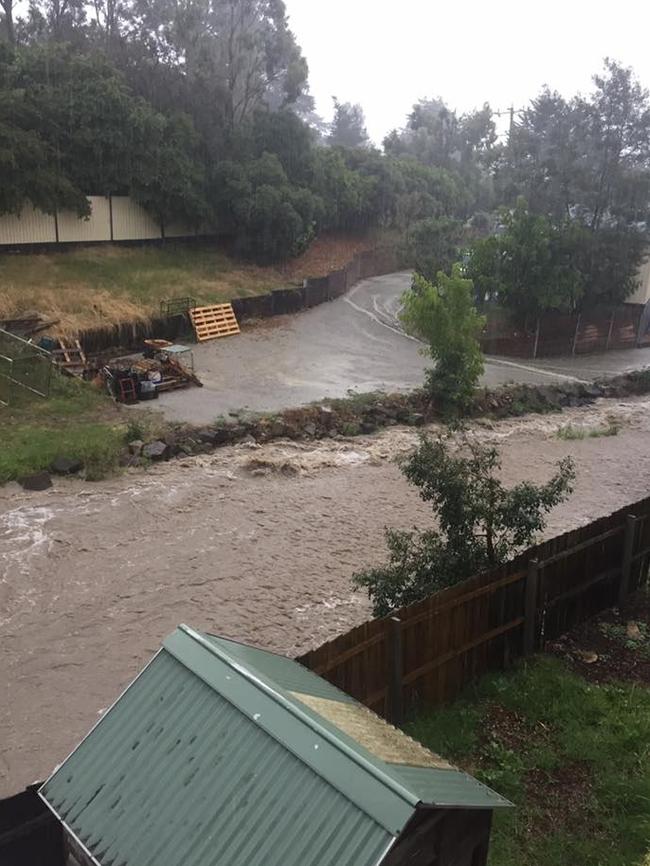 Flash flooding turned Hereford Rd, Lilydale, into a river yesterday.