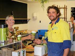 SPEEDY SERVICE: Genevieve Rogers with customer Liam, who gets his daily coffee from ReX. Picture: Jess Townsend