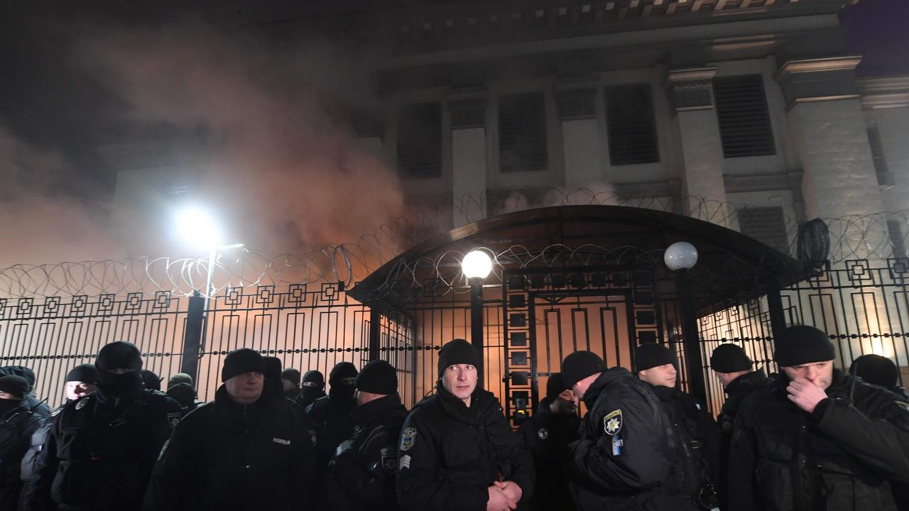 Policemen stand in front of the Russian Embassy in Kiev. Picture: AFP