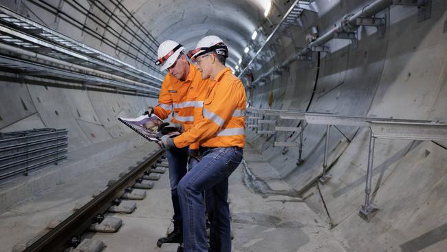 Cross River Rail CEO Graeme Newton and Transport Minister Mark Bailey inspect works underway deep inside the Cross River Rail tunnels. Picture Lachie Millard