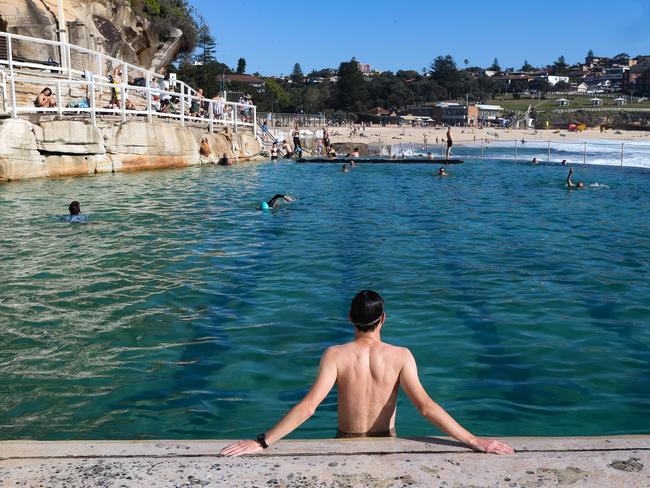 Swimmers lapping up the hot conditions at the rock pool at Bronte Beach. Picture: NCA Newswire / Gaye Gerard