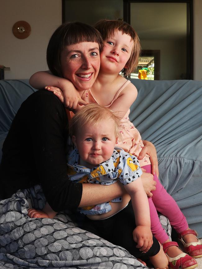 Alison Johnson with children Elywn Griffiths 1 and Eila Griffiths 3 at home in South Hobart. Alison has been waiting for some time for removal of a kidney that has failed and has now been forced to go through the private health system. Picture: NIKKI DAVIS-JONES