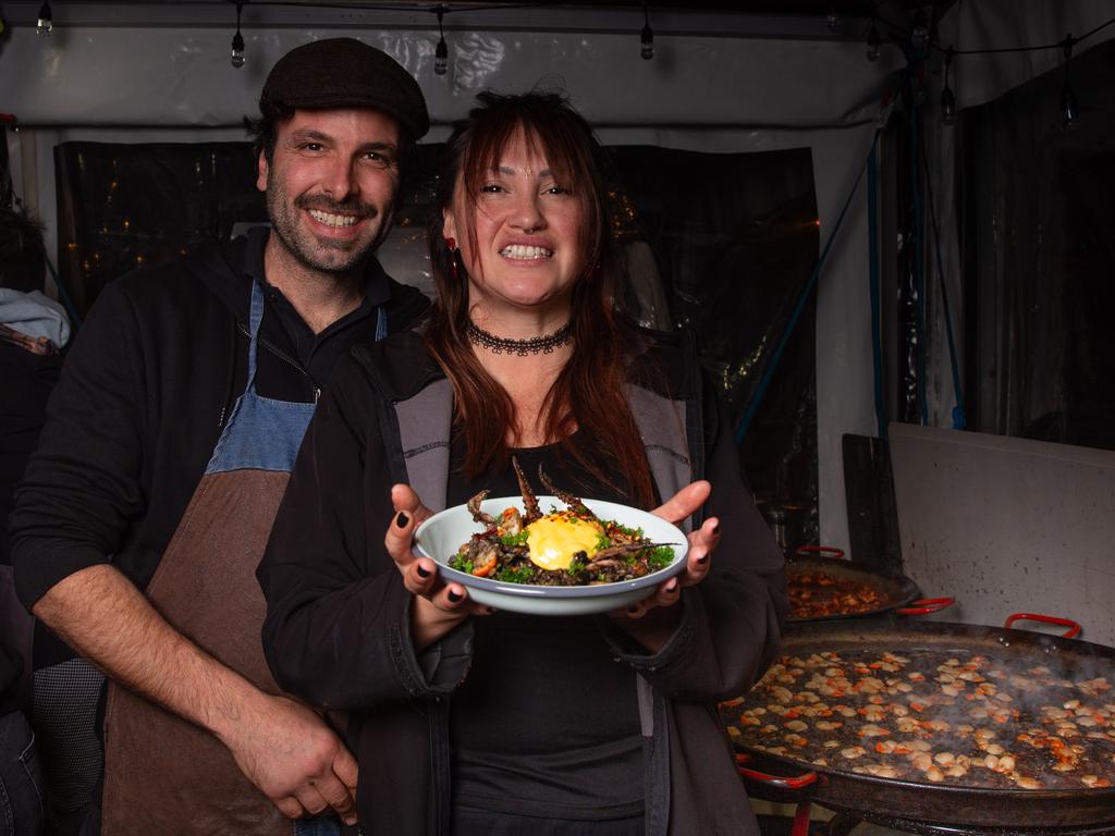 The City of Hobart Winter Feast. Kiltro owners Andrea Comino and Caro Montero with their Dark Paella dish. Picture: Linda Higginson